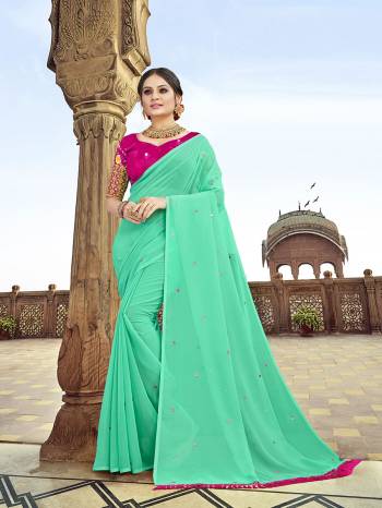 Preety This Designer Saree Are Fine Saree Paired With Contrasted Blouse.This Saree Are Georgette And Blouse Are Art Silk Based Fabric With Mirror,Designer Embroidery Work Blouse. Buy This Pretty Saree Now.