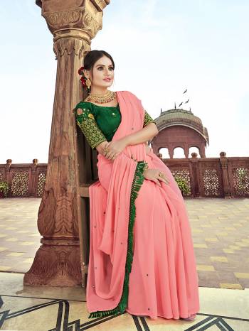 Preety This Designer Saree Are Fine Saree Paired With Contrasted Blouse.This Saree Are Georgette And Blouse Are Art Silk Based Fabric With Mirror,Designer Embroidery Work Blouse. Buy This Pretty Saree Now.