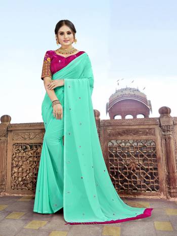 Preety This Designer Saree Are Fine Saree Paired With Contrasted Blouse.This Saree Are Georgette And Blouse Are Art Silk Based Fabric With Mirror,Designer Embroidery Work Blouse. Buy This Pretty Saree Now.