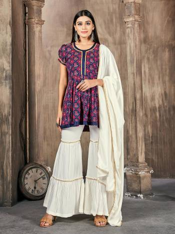 Greb This Readymade Plazzo Suits In Fine Color Top And Dupatta Are Rayon With Dupatta Are Rayon Fabricated Beautified With Printed Designer. It Is Light In Weight And Easy To Carry All Day Long. 