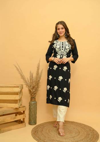 Garb This Disigner Readymade Long Kurti With Pant In Fine Color. Its Kurti And Pant Are Rayon Slub Fabricated Beautified With Designer Multy Embroidery Work. It Is Light In Weight And Easy To Carry All Day Long. Buy Now.