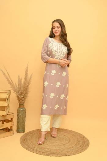 Garb This Disigner Readymade Long Kurti With Pant In Fine Color. Its Kurti And Pant Are Rayon Slub Fabricated Beautified With Designer Multy Embroidery Work. It Is Light In Weight And Easy To Carry All Day Long. Buy Now.