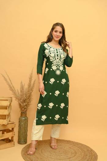 Garb This Disigner Readymade Long Kurti With Pant In Fine Color. Its Kurti And Pant Are Rayon Slub Fabricated Beautified With Designer Multy Embroidery Work. It Is Light In Weight And Easy To Carry All Day Long. Buy Now.