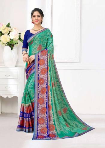 Your Personality In This Lovely Colored Designer Saree. This Saree?Are Brasso And Blouse Are Fabricated On Dupion Silk Beautified With Printed Designer. Buy This Pretty Saree Now.