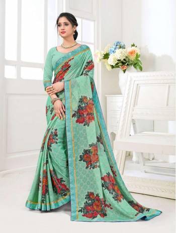 Your Personality In This Lovely Colored Designer Saree. This Saree?Are Brasso And Blouse Are Fabricated On Dupion Silk Beautified With Printed Designer. Buy This Pretty Saree Now.