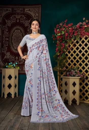 Enhance Your Personality In This Lovely Colored Designer Saree. This Saree?And Blouse Are Fabricated On Art Silk Beautified With Designer Printed. Buy This Pretty Saree Now.