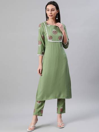 Attrective Looking This Readymade Long Kurti With Bottom In Fine Color. This Kurti And Pant Are Fabricated On Rayon Beautified With Designer Khadi Printed. It Is Light In Weight And Easy To Carry All Day Long. 