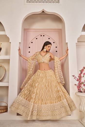 Stylist This Partywear Heavy Designer Lahenga Choli In Fine Color.This  Lahenga Choli Are Mono Net Fabricated Beautified With Attrective Cotton Thread,Jari,Sendwitch Sequance Embroidery With Fancy Lace.Buy Now. 