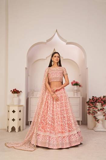 Stylist This Partywear Heavy Designer Lahenga Choli In Fine Color.This  Lahenga Choli Are Mono Net Fabricated Beautified With Attrective Cotton Thread,Jari,Sendwitch Sequance Embroidery With Fancy Lace.Buy Now. 