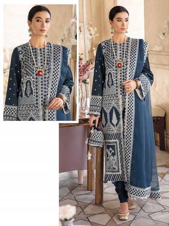 Look Attrctive This Designer Pakistani Suit In Dark Color.Its Pretty Heavy Designer Embroidery Work Top Is Faux Georgette Based Paired With Santoon Bottom And Net Fabricated Dupatta Which Gives An Attractive To The Suit.