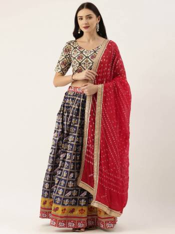 Attrective This Partywear Heavy Designer Lehenga Choli And Dupatta In Fine Color. Its Preety Choli Are Cotton,Lahenga Are Patola Silk With Dupatta Are Bandhej Silk Fabricated On Beautified With Heavy Attractive Printed And Wevon Patala Designer.Buy Now. 