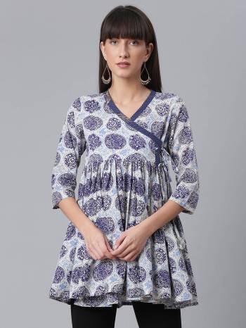 Attrective This Readymade Western Kurti In Fine Color Fabricated On Cotton Beautified With Designer Printed. It Is Light In Weight And Easy To Carry All Day Long. 