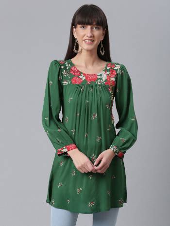 Attrective This Readymade Western Kurti In Fine Color Fabricated On Rayon Beautified With Designer Printed. It Is Light In Weight And Easy To Carry All Day Long. 