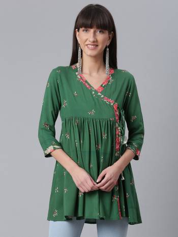 Attrective This Readymade Western Kurti In Fine Color Fabricated On Rayon Beautified With Designer Printed. It Is Light In Weight And Easy To Carry All Day Long. 