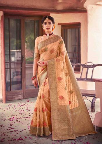 Garb This Traditional Saree Paired With Blouse.This Saree And Blouse Are Soft Cotton Based Fabric With Heavy Wevon Designer Work. Buy This Pretty Saree Now.