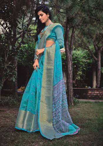 Attrective This Partywear Stylist Designer Fine Colour Saree Paired With Blouse.This Saree And Blouse Are Velvet Chiffon Fabric With Wevon Designer With Looking Printed. Buy This Pretty Saree Now.