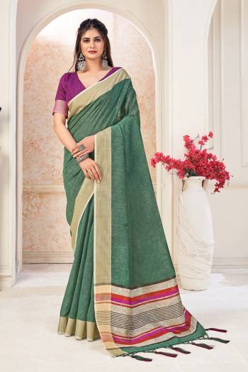 Looking This Tassle Saree Paired With Blouse.This Saree And Blouse Are Linen Based Fabric With Wevon Jari Designer. Buy This Pretty Saree Now.