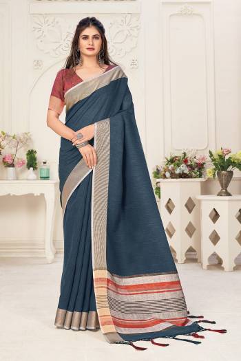 Looking This Tassle Saree Paired With Blouse.This Saree And Blouse Are Linen Based Fabric With Wevon Jari Designer. Buy This Pretty Saree Now.