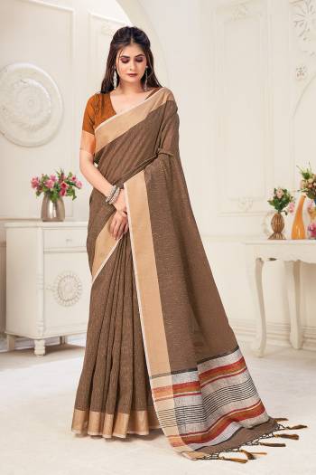 Looking This Tassle Saree Paired With Blouse.This Saree And Blouse Are Linen Based Fabric With Wevon Jari Designer. Buy This Pretty Saree Now.