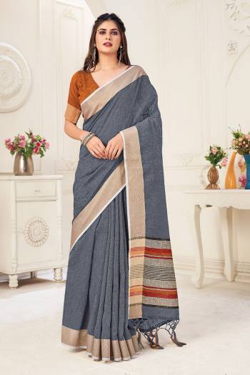 Looking This Tassle Saree Paired With Blouse.This Saree And Blouse Are Linen Based Fabric With Wevon Jari Designer. Buy This Pretty Saree Now.