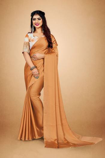 Attrective This Partywear Saree Are Fine Color Saree Paired With Blouse.This Saree Are Satin Georgette And Blouse Are Art Silk Based With Printed And Mirror Work Fabric. Buy This Pretty Saree Now.