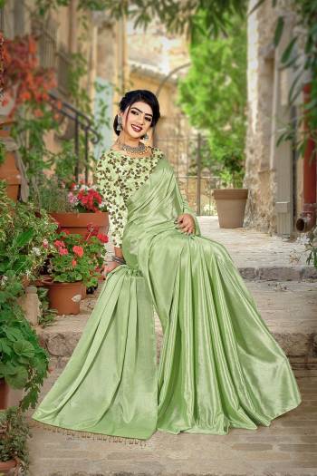 Garb This Designer Saree Are Fine Color Paired With Blouse.This Saree Are Chinon And Blouse Are Net Based With Designer Sequance Embroidery Work Fabric. Buy This Pretty Saree Now.