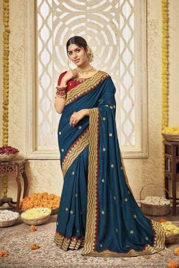 Stylist This Partywear Designer Fine Colour Saree Paired With Contrasted Blouse.This Saree Are Vichitra Silk And Blouse Are Phantom Silk Fabric With Heavy Jacquad Border With Jari,Resham Embroidery Work Blouse. Buy This Pretty Saree Now.