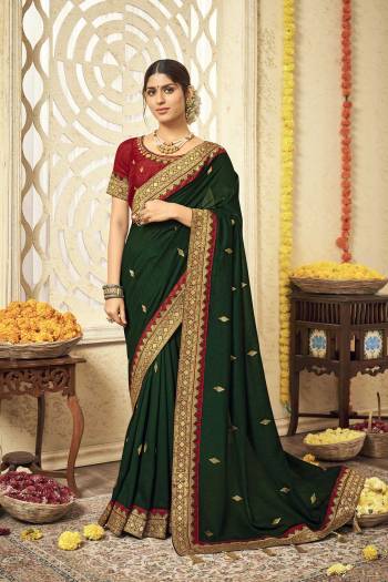 Stylist This Partywear Designer Fine Colour Saree Paired With Contrasted Blouse.This Saree Are Vichitra Silk And Blouse Are Phantom Silk Fabric With Heavy Jacquad Border With Jari,Resham Embroidery Work Blouse. Buy This Pretty Saree Now.