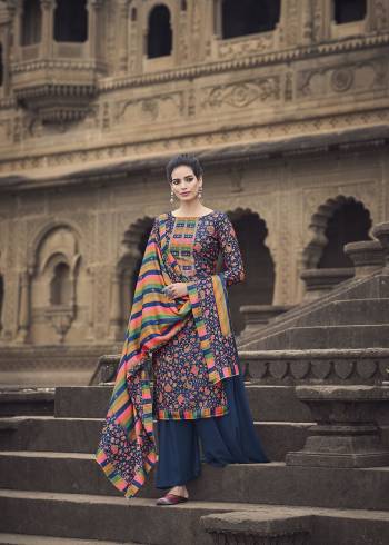 Garb This Designer Plazzo Suits In Lovely Color.?Its Pretty Designer Digital Printed With Hand Work Top Is Pashmina Silk Based Paired Bottom Pashmina Silk With Acrylic Pashmina Fabricated Digital Printed Dupatta.Which Gives An Attractive To The Dress.Buy Now.