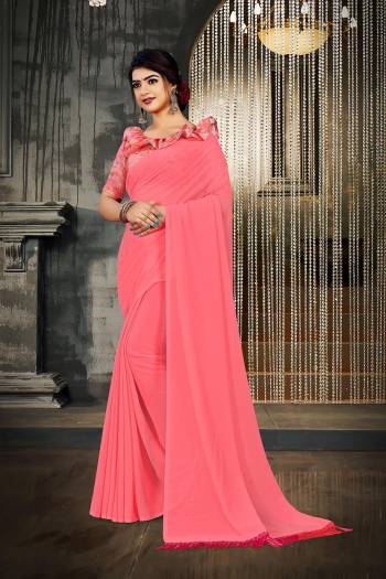 Attrective This Designer Partywear Saree Are Fine Saree Paired With Blouse.This Saree Are Georgette And Blouse Are Art Silk Wevon Designer Based Fabric. Buy This Pretty Saree Now.