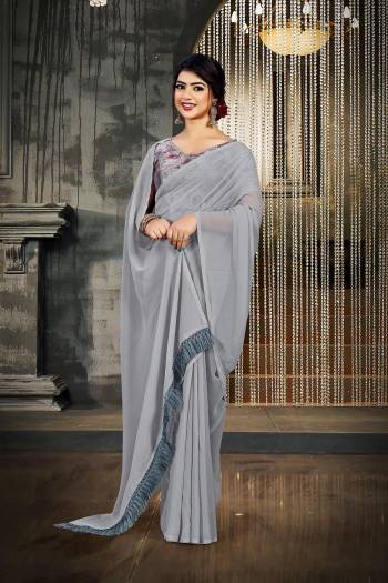 Attrective This Designer Partywear Saree Are Fine Saree Paired With Blouse.This Saree Are Georgette And Blouse Are Art Silk Wevon Designer Based Fabric. Buy This Pretty Saree Now.