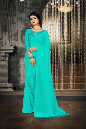 Attrective This Designer Partywear Saree Are Fine Saree Paired With Blouse.This Saree Are Georgette And Blouse Are Art Silk Wevon Designer Based Fabric. Buy This Pretty Saree Now.