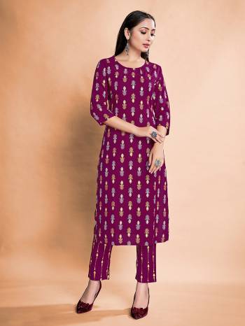 Greb This Readymade Kurti With Pant In Fine Color.This Kurti And Pant Are Rayon Fabricated Beautified With Foil Printed Designer. It Is Light In Weight And Easy To Carry All Day Long. 