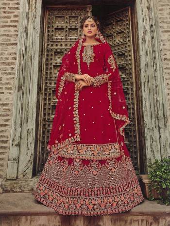 Garb This Designer Wedding Sharara Suit In Fine Color.Its Pretty Heavy Designer Embroidery With Diamond Work Top Is Georgette Based Paired With Georgette Bottom And Soft Net Fabricated Work Dupatta Which Gives An Attractive To The Suit.Buy Now.