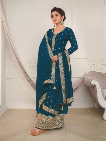 Attrective This Designer Plazzo Suit In Lovely Dark Color.Its Pretty Heavy Designer Embroidery Work Top Is Silk Georgette Based Paired With Silk Georgette Bottom And Silk Georgette Fabricated Dupatta Which Gives An Attractive To The Suit.Buy Now.