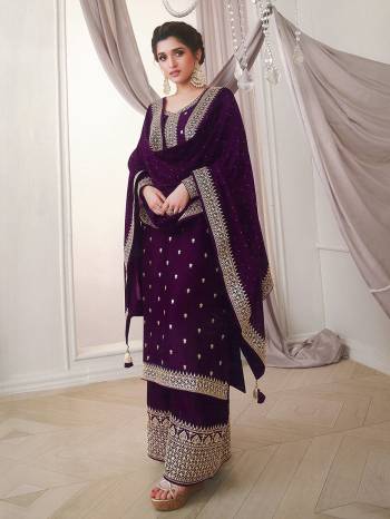 Attrective This Designer Plazzo Suit In Lovely Dark Color.Its Pretty Heavy Designer Embroidery Work Top Is Silk Georgette Based Paired With Silk Georgette Bottom And Silk Georgette Fabricated Dupatta Which Gives An Attractive To The Suit.Buy Now.