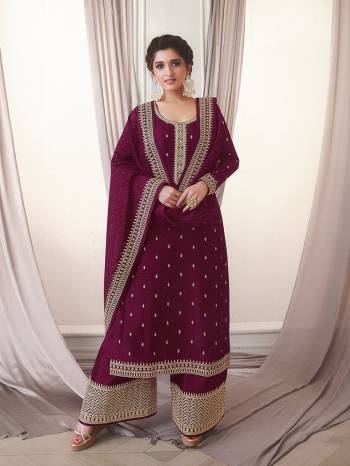 Attrective This Designer Plazzo Suit In Lovely Dark Color.Its Pretty Heavy Designer Embroidery Work Top Is Silk Georgette Based Paired With Silk Georgette Bottom And Silk Georgette Fabricated Dupatta Which Gives An Attractive To The Suit.Buy Now.