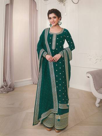 Attrective This Designer Plazzo Suit In Lovely Dark Color.Its Pretty Heavy Designer Embroidery Work Top Is Silk Georgette Based Paired With Silk Georgette Bottom And Silk Georgette Fabricated Dupatta Which Gives An Attractive To The Suit.Buy Now.