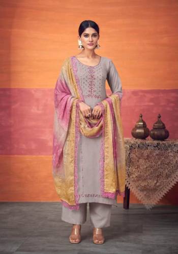 Garb This Designer Suits In Lovely Color.?Its Pretty Designer Embroidery Work Top Is Maslin Based Paired Bottom Viscose Santoon With Maslin Fabricated Digital Printed With Work Lace Dupatta.Which Gives An Attractive To The Dress.Buy Now.