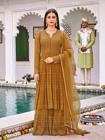 Attrective This Designer Sharara Suit In Fine Color.Its Pretty Heavy Designer Embroidery Work Top Is Georgette Based Paired With Georgette Bottom And Soft Net Fabricated Dupatta Which Gives An Attractive To The Suit.