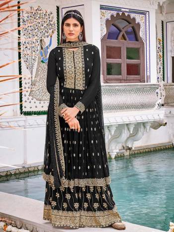 Attrective This Designer Sharara Suit In Fine Color.Its Pretty Heavy Designer Embroidery Work Top Is Georgette Based Paired With Georgette Bottom And Naznin Fabricated Dupatta Which Gives An Attractive To The Suit.