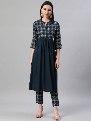 Looking This Readymade Long Kurti With Bottom In Fine Color. This Kurti And Pant Are Fabricated On Rayon Beautified With Designer Foil Printed. It Is Light In Weight And Easy To Carry All Day Long. 