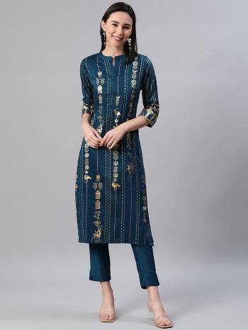 Looking This Readymade Long Kurti With Bottom In Fine Color. This Kurti And Pant Are Fabricated On Rayon Beautified With Designer Foil Printed. It Is Light In Weight And Easy To Carry All Day Long. 