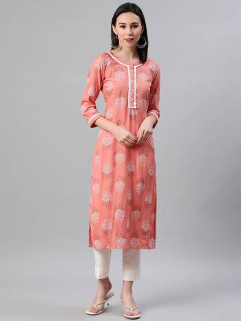 Looking This Readymade Long Kurti With Bottom In Fine Color. This Kurti And Pant Are Fabricated On Rayon Beautified With Designer Khadi Printed. It Is Light In Weight And Easy To Carry All Day Long. 