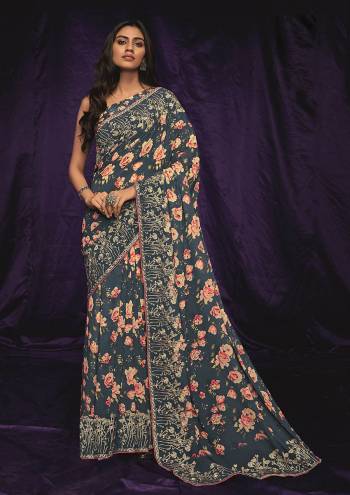 Looking This Partywear Saree Are Fine Saree Paired With Blouse.This Saree And Blouse Are Georgette Fabric With Designer Thread Embroidery Lace Border Work With Digital Printed. Buy This Pretty Saree Now.