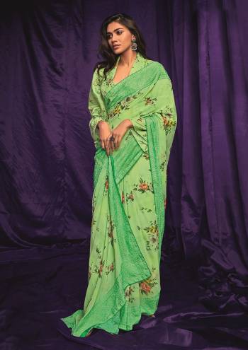 Looking This Partywear Saree Are Fine Saree Paired With Blouse.This Saree And Blouse Are Georgette Fabric With Designer Thread Embroidery Lace Border Work With Digital Printed. Buy This Pretty Saree Now.