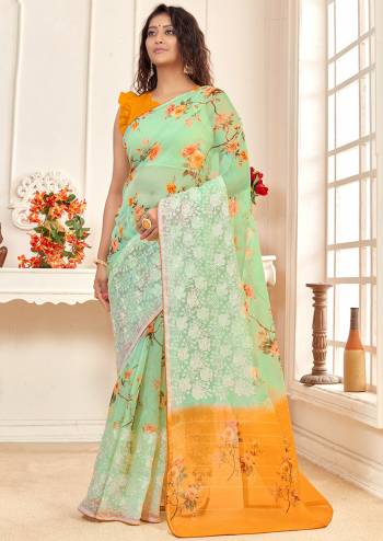 Attrective This Partywear Stylist Designer Fine Colour Saree Paired With Contrasted Blouse.This Saree And Blouse Are Organza Fabric With Embroidery Border Work,Digital Printed. Buy This Pretty Saree Now.