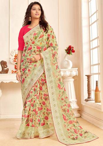 Attrective This Partywear Stylist Designer Fine Colour Saree Paired With Contrasted Blouse.This Saree And Blouse Are Organza Fabric With Embroidery Border Work,Digital Printed. Buy This Pretty Saree Now.