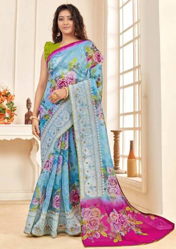 Attrective This Partywear Stylist Designer Fine Colour Saree Paired With Contrasted Blouse.This Saree And Blouse Are Organza Fabric With Embroidery Border Work,Digital Printed. Buy This Pretty Saree Now.