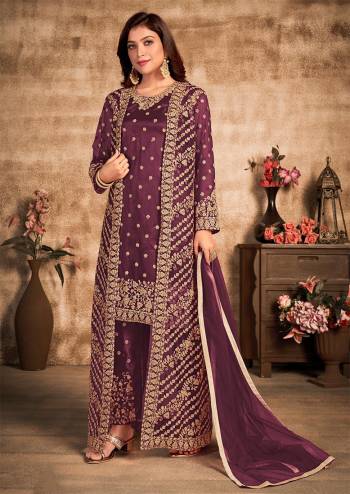 Stylist This Partywear Designer Long Length Suit With Jacket In Lovely Dark Color.Its Pretty Heavy Designer Thread,Sequance Embroidery Work Top Is Net Based Paired With Satin Bottom And Net Fabricated Dupatta Which Gives An Attractive To The Suit.Buy Now.